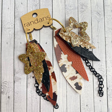 Load image into Gallery viewer, Randans fringe hoop earrings- cow print *read entire description prior to ordering*